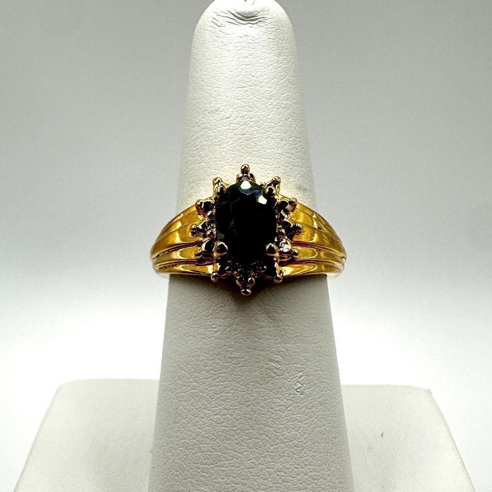 Deep blue sapphire with diamond accent gold over sterling‎ silver ring!